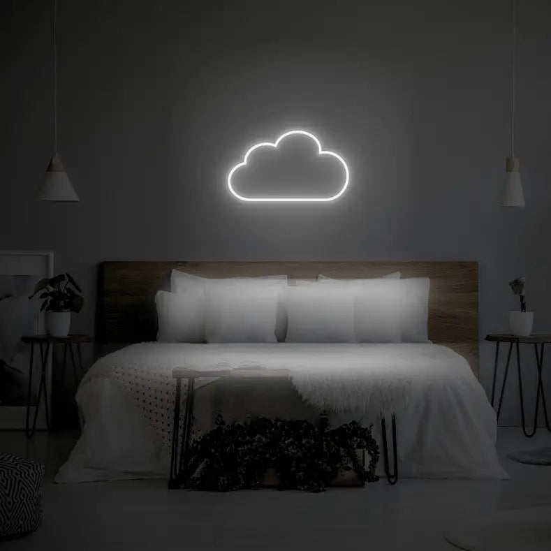 Cloud LED Neon Light Sign in white, featuring cloud outline illuminated above a bed.