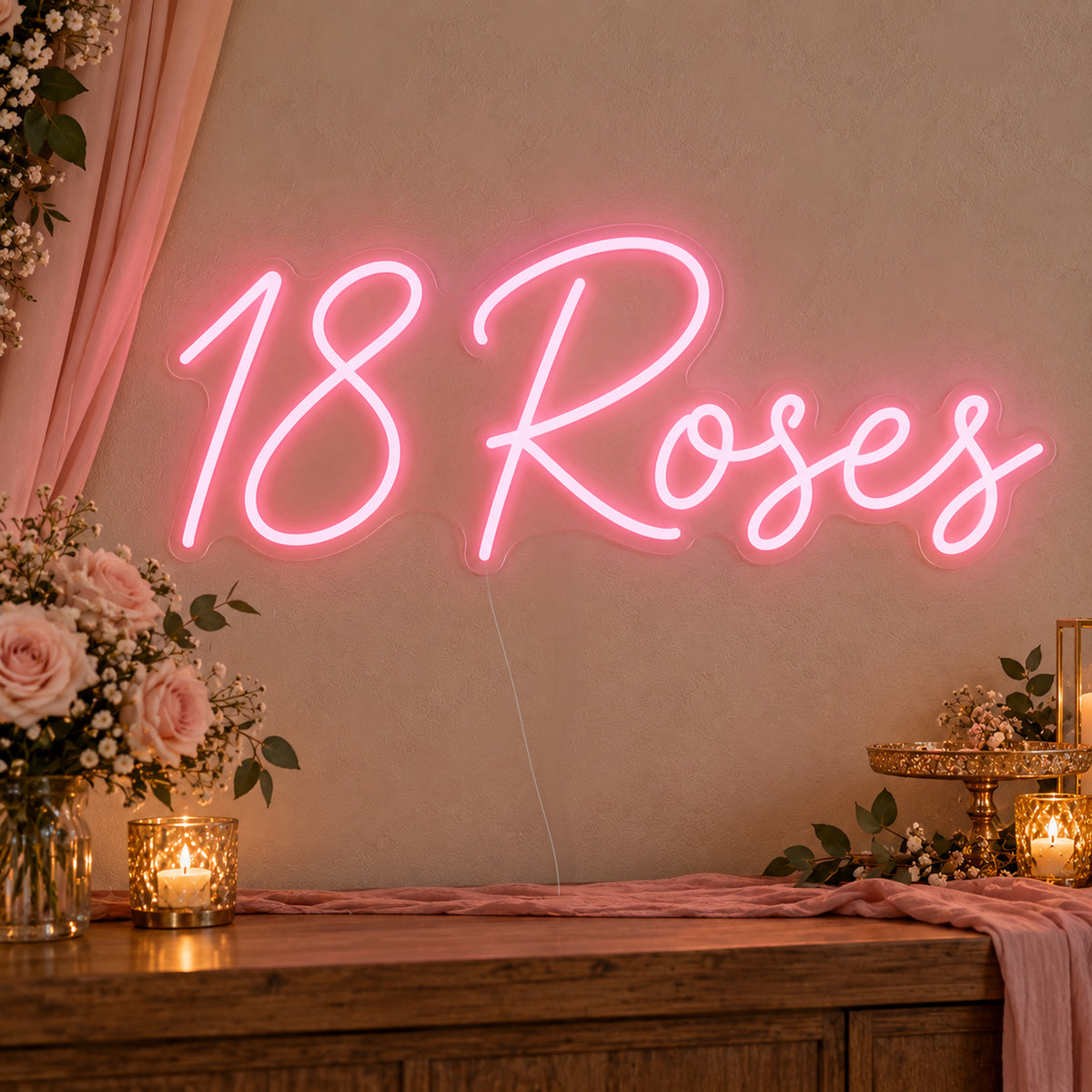 18 Roses Neon Sign on clear cut-to-shape acrylic, illuminated on a wall in a styled celebration setting