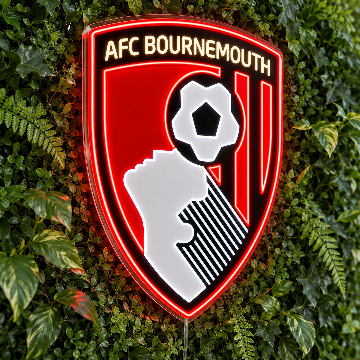 AFC Bournemouth Old Logo LED Neon Sign, featuring team logo displayed on a green foliage wall.