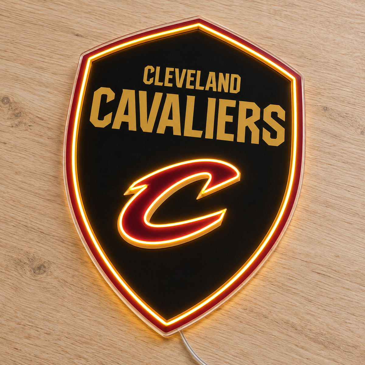 Cleveland Cavaliers LED Neon Sign, featuring team logo displayed on a wooden surface.