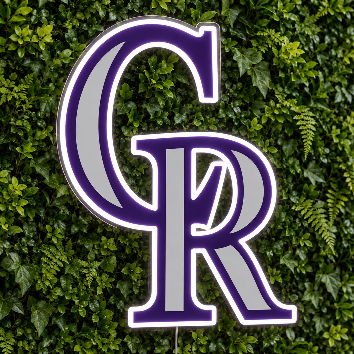 Colorado Rockies LED Neon Sign, featuring team logo displayed on a green foliage wall.