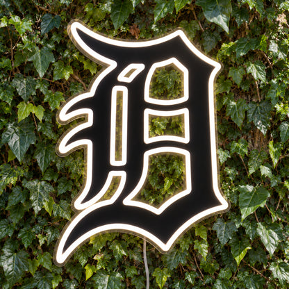Detroit Tigers LED Neon Sign, featuring team logo displayed on a green foliage wall.