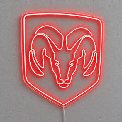 Dodge Ram Logo LED Neon Sign in red, featuring a Ram head inside a shield outline on a grey wall.