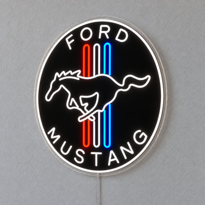 Ford Mustang Badge LED Neon Sign in red, white and blue, featuring a circular Ford Mustang horse badge on a grey wall.