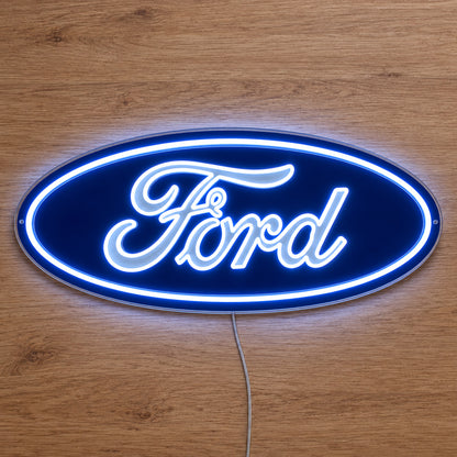 Ford Oval LED Neon Sign in blue and white, featuring oval Ford logo on a wooden surface.