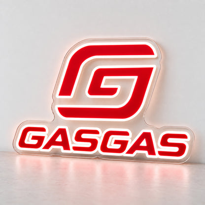 GasGas (Red) LED Neon Sign, featuring illuminated GasGas emblem and lettering standing on a light reflective surface.