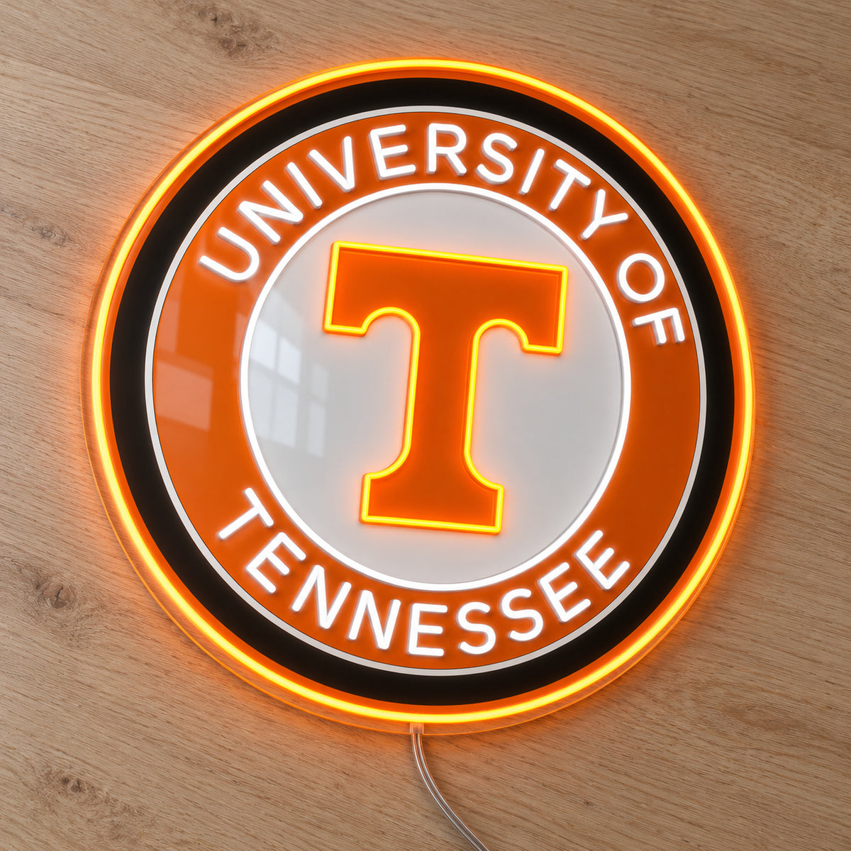 University of Tennessee Circle Logo LED Neon Sign, featuring team logo displayed on a wooden surface.
