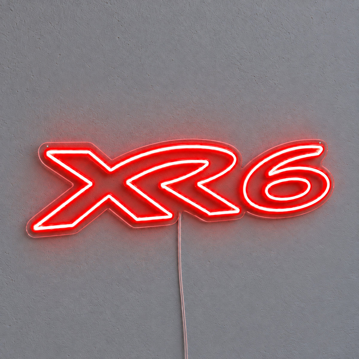 XR6 Ford Falcon LED Neon Sign in red, featuring XR6 lettering on a grey wall.