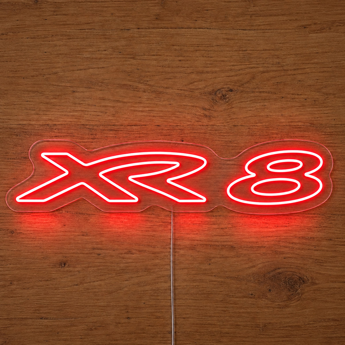 XR8 Ford Falcon LED Neon Sign in red, featuring XR8 lettering on a wooden surface.