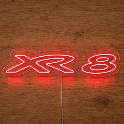 XR8 Ford Falcon LED Neon Sign in red, featuring XR8 lettering on a wooden surface.