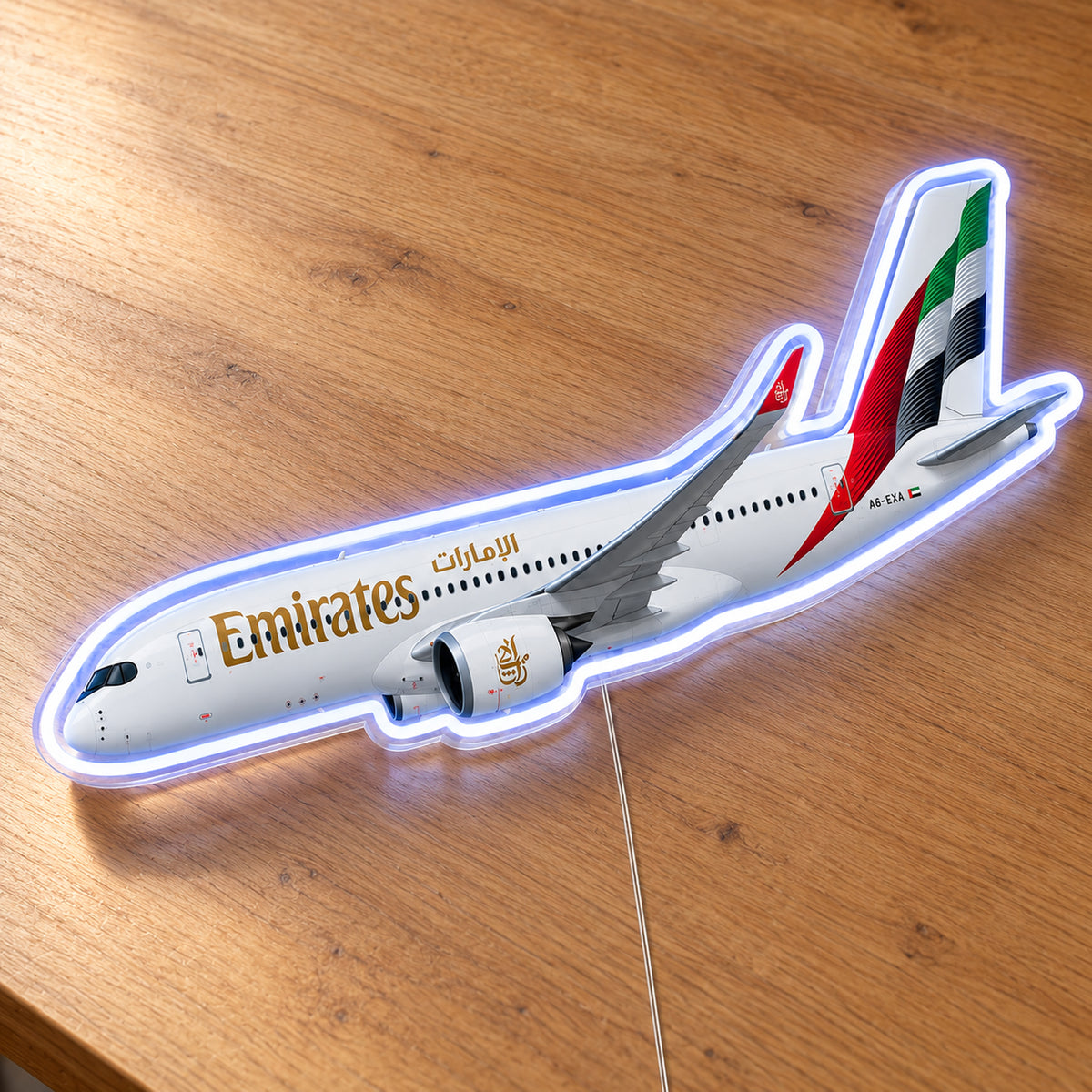Airbus A350-900 Emirates Neon Sign with printed aircraft details and an illuminated LED outline on clear acrylic, shown on a wooden surface, registration A6-EXA