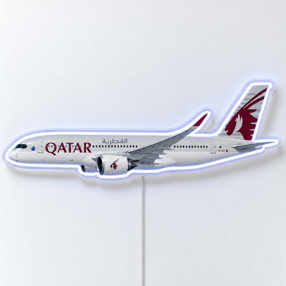 Airbus A350-900 Qatar Airways Neon Sign with printed aircraft details and an illuminated LED outline on clear acrylic, shown from the front on a white surface, registration A7-ALA