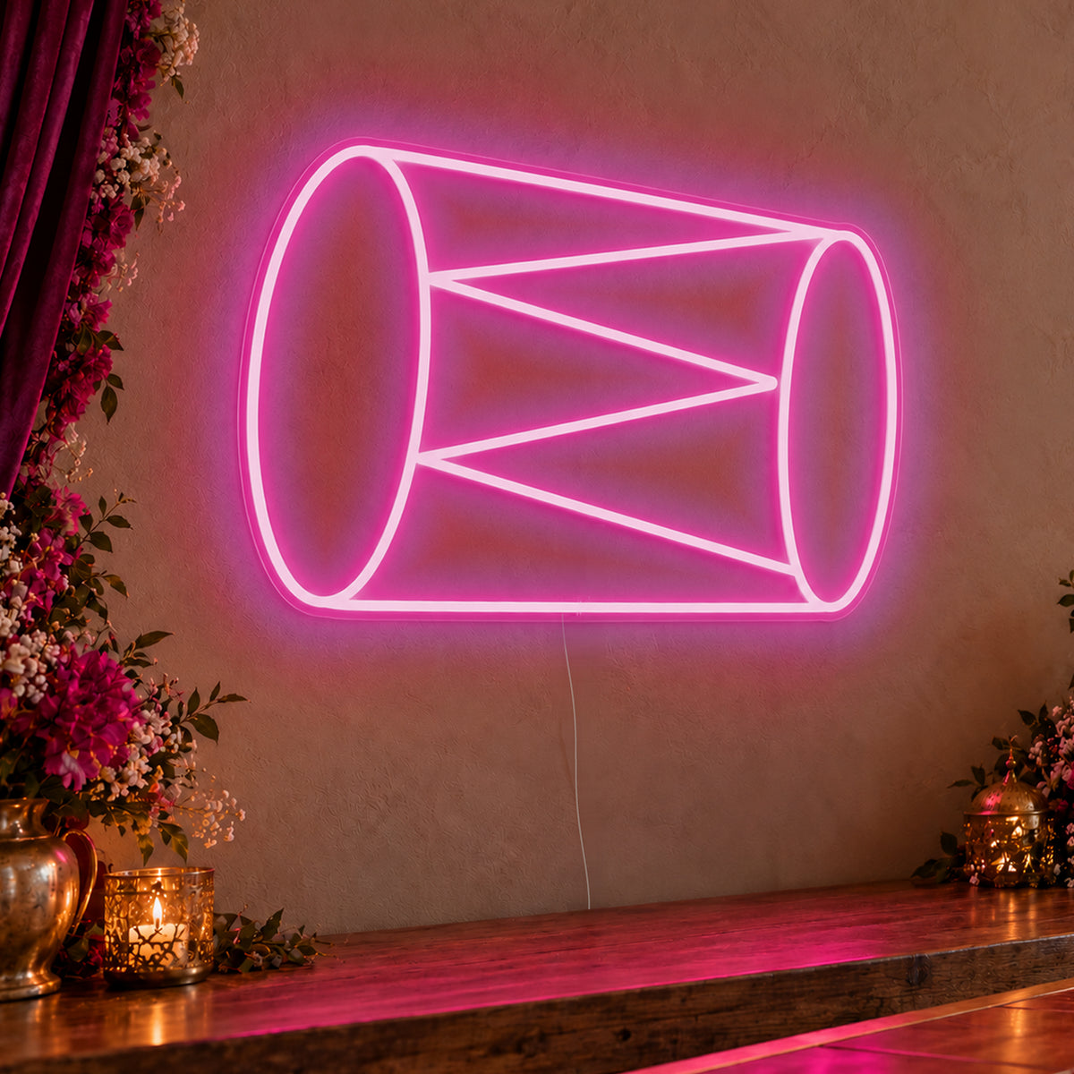 Dhol Drum Neon Sign in pink LED neon on clear acrylic, angled view
