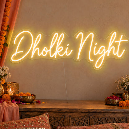 Dholki Night Neon Sign in gold LED neon on clear acrylic, angled view