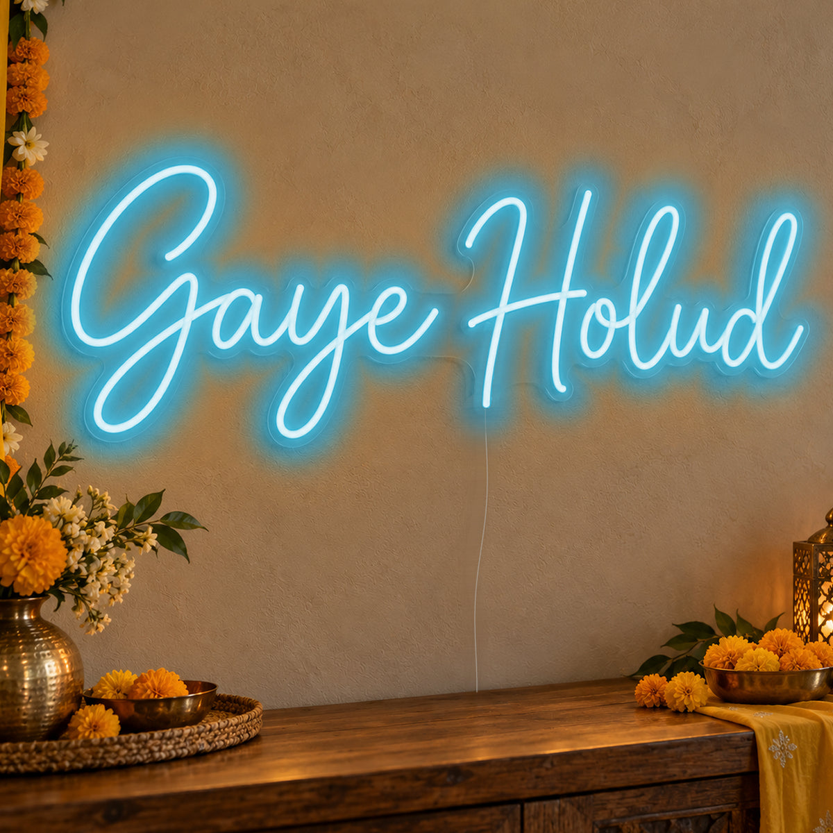 Gaye Holud Neon Sign in ice blue LED neon on clear acrylic, angled view