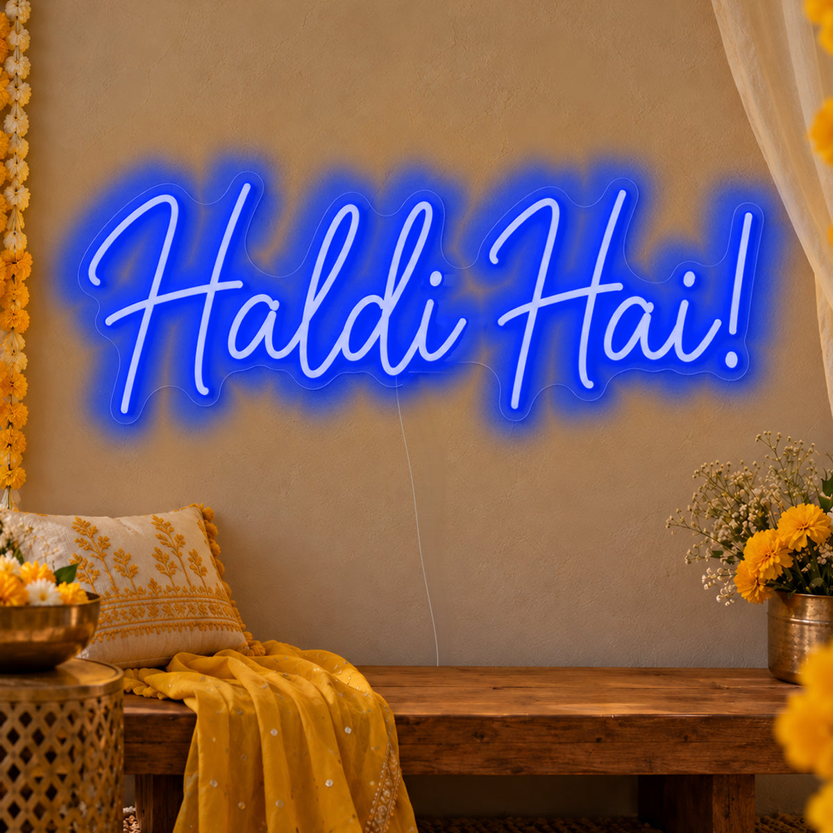 Haldi Hai Neon Sign in blue LED neon on clear acrylic, angled view