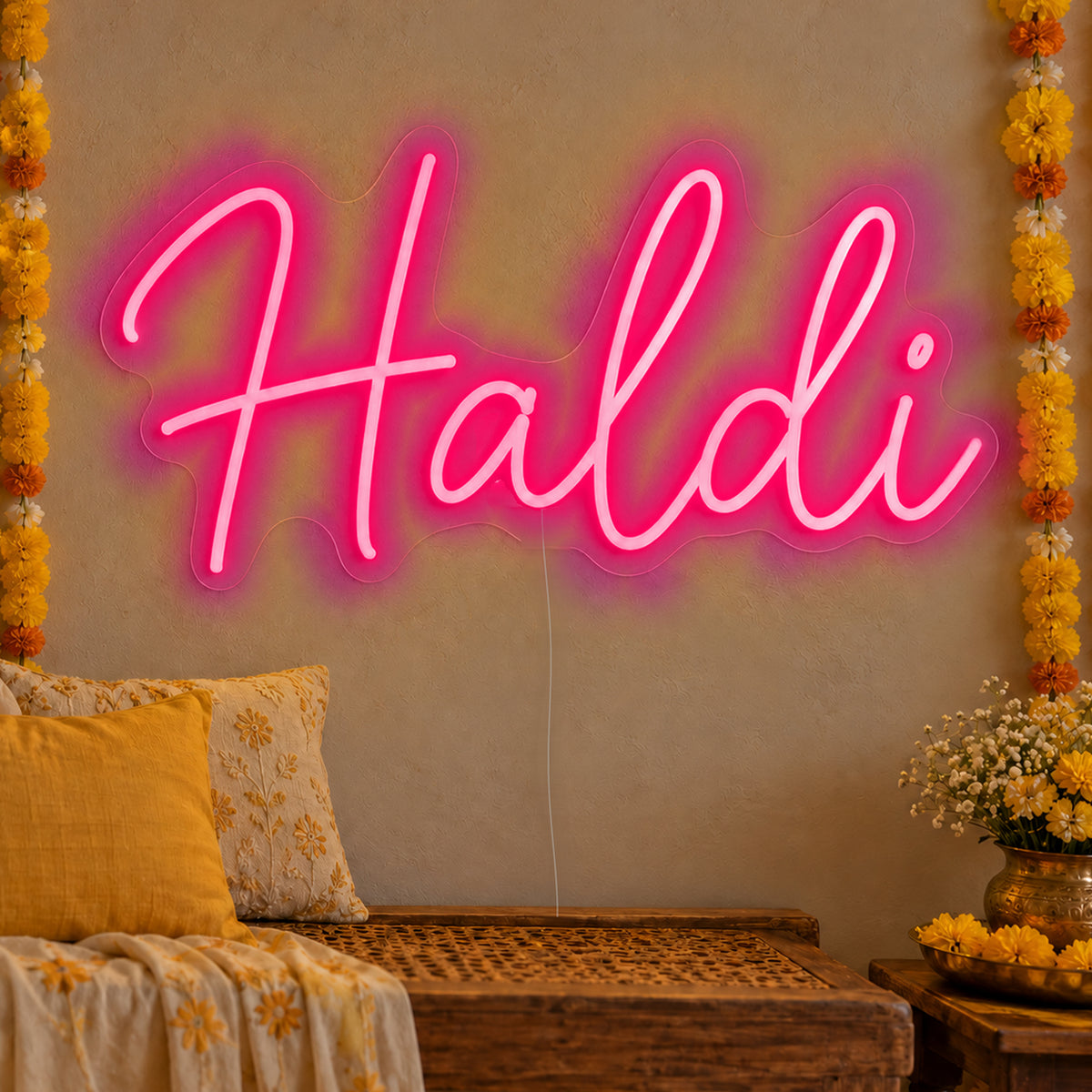 Haldi Neon Sign in rose red LED neon on clear acrylic, angled view