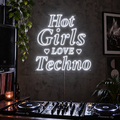 Hot Girls Love Techno Neon Sign, RGB colour-changing option shown in white with heart details above a DJ setup.