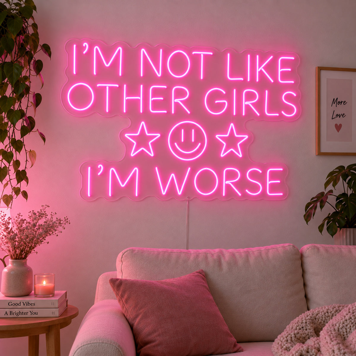 I'm Not Like Other Girls I'm Worse Neon Sign glowing pink with stars and a smiley face above a cream sofa.