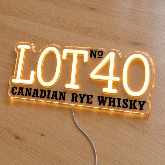 Lot No.40 LED neon sign on a light wooden surface, second angled view