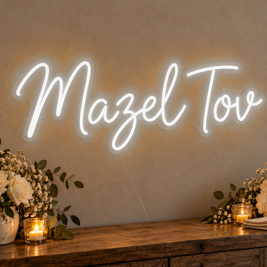 Mazel Tov Neon Sign in white LED neon on clear acrylic, angled view