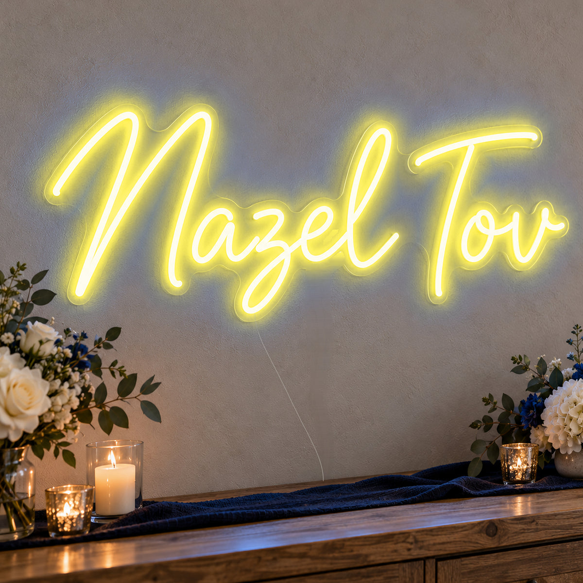 Mazel Tov Blue Neon Sign in yellow LED neon on clear acrylic, angled view