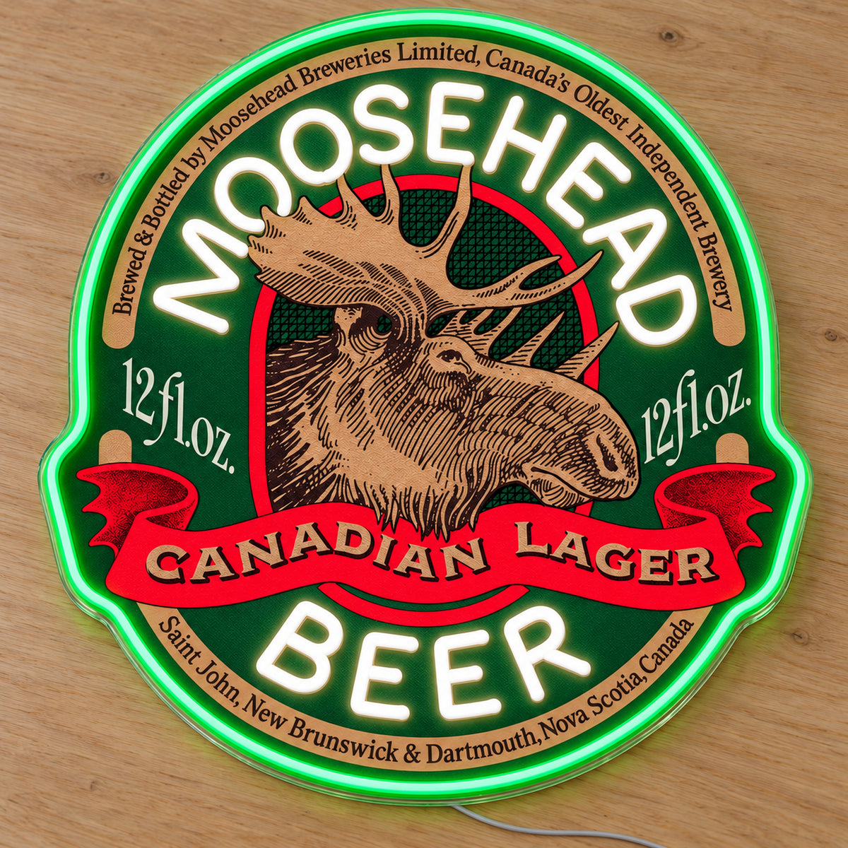 Moosehead LED neon sign on a light wooden surface, front view