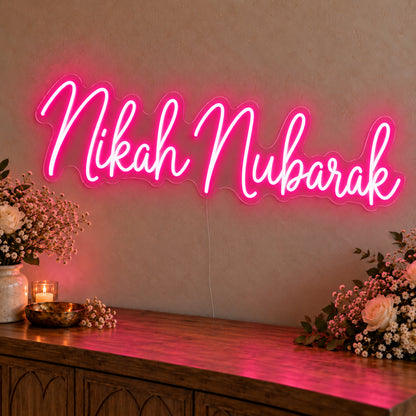 Nikah Mubarak Neon Sign in rose red LED neon on clear acrylic, angled view
