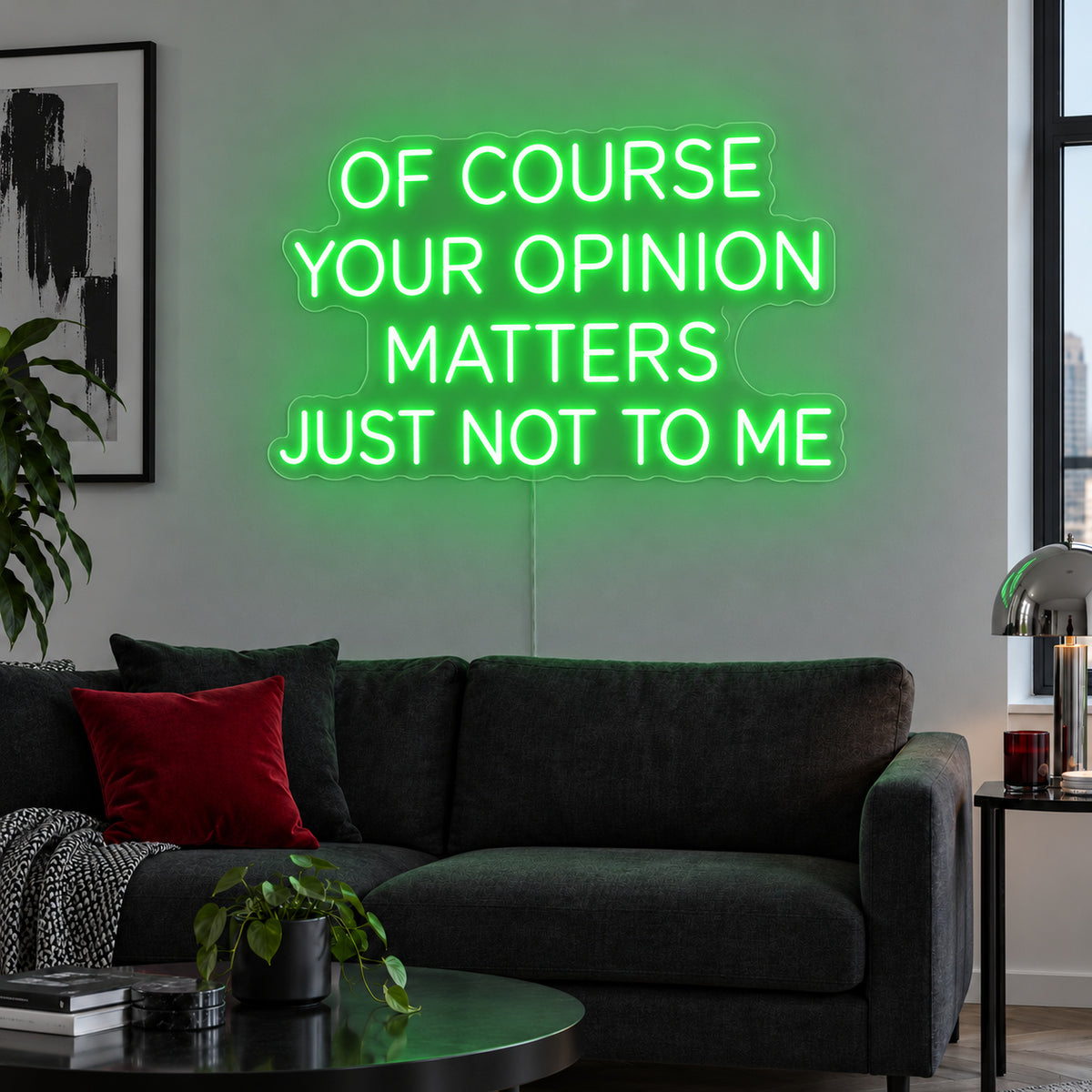 Of Course Your Opinion Matters Just Not To Me Neon Sign with green lighting, displayed above a black sofa.