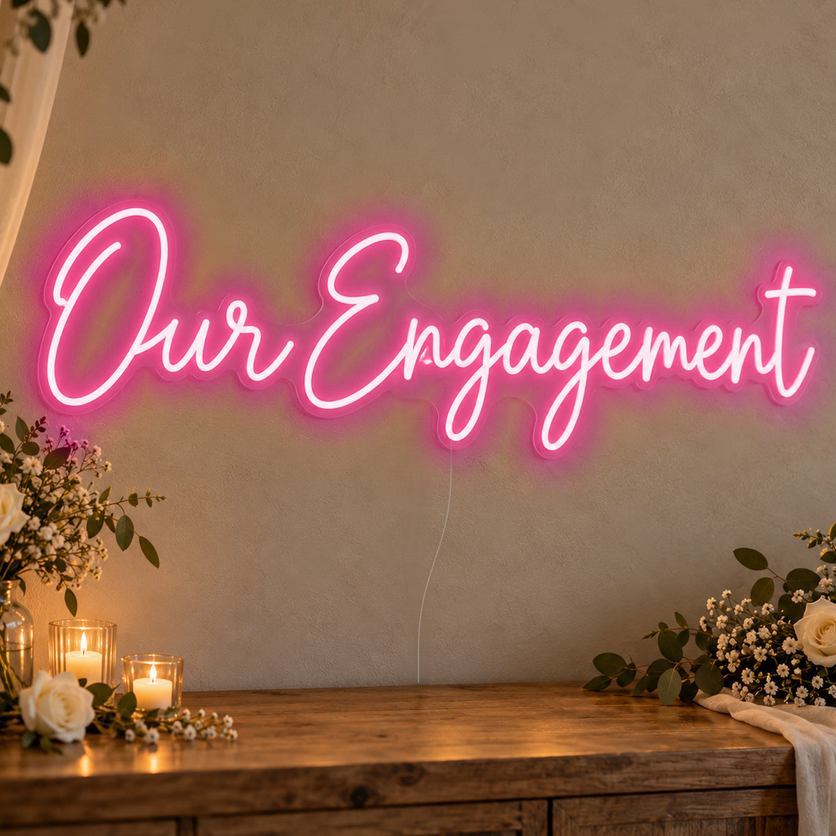 Our Engagement Neon Sign in rose red LED neon on clear acrylic, angled view