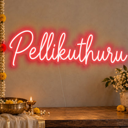 Pellikuthuru Neon Sign in red LED neon on clear acrylic, angled view