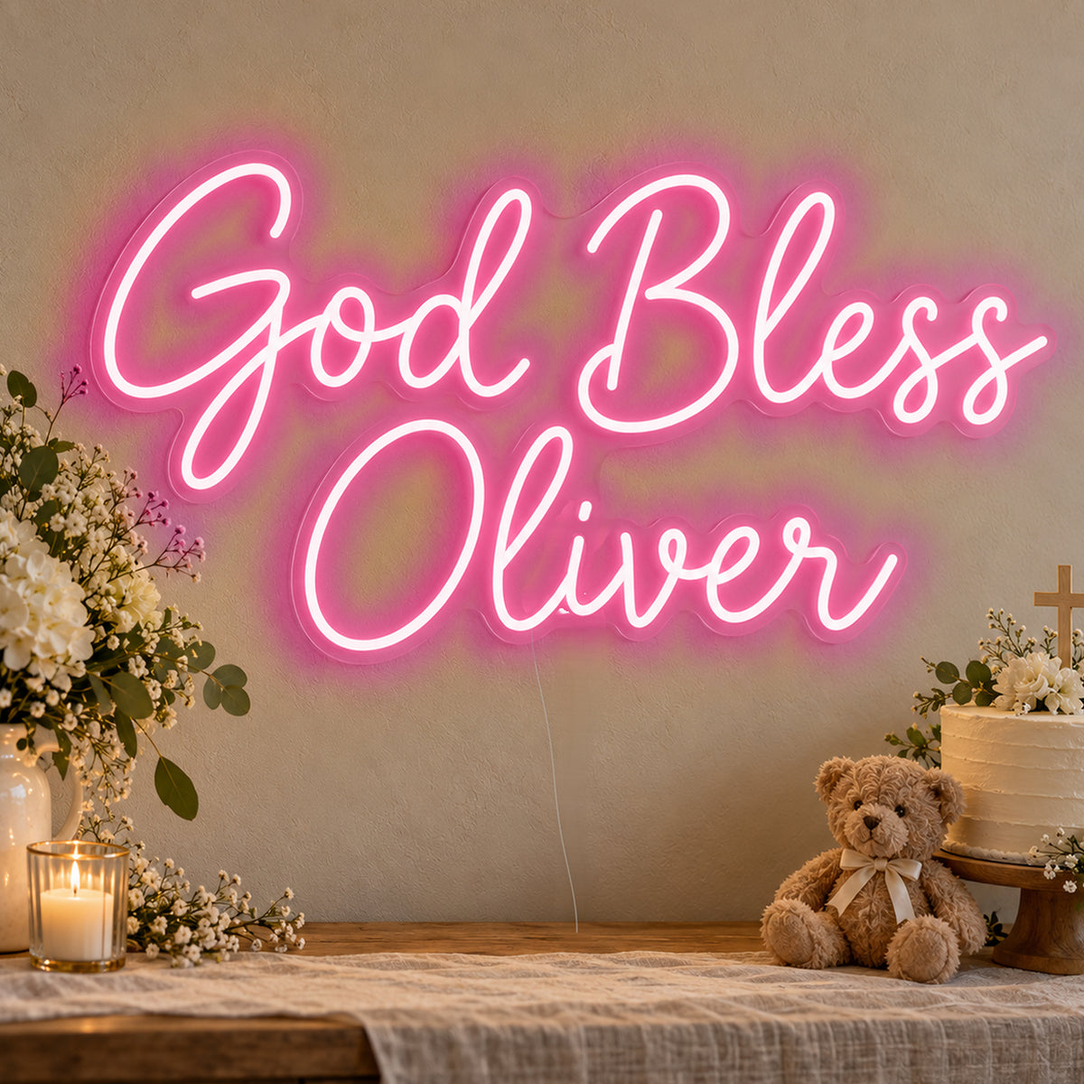 Personalised God Bless Neon Sign in rose red LED neon on clear acrylic, angled view