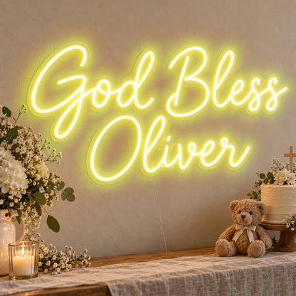 Personalised God Bless Neon Sign in yellow LED neon on clear acrylic, angled view