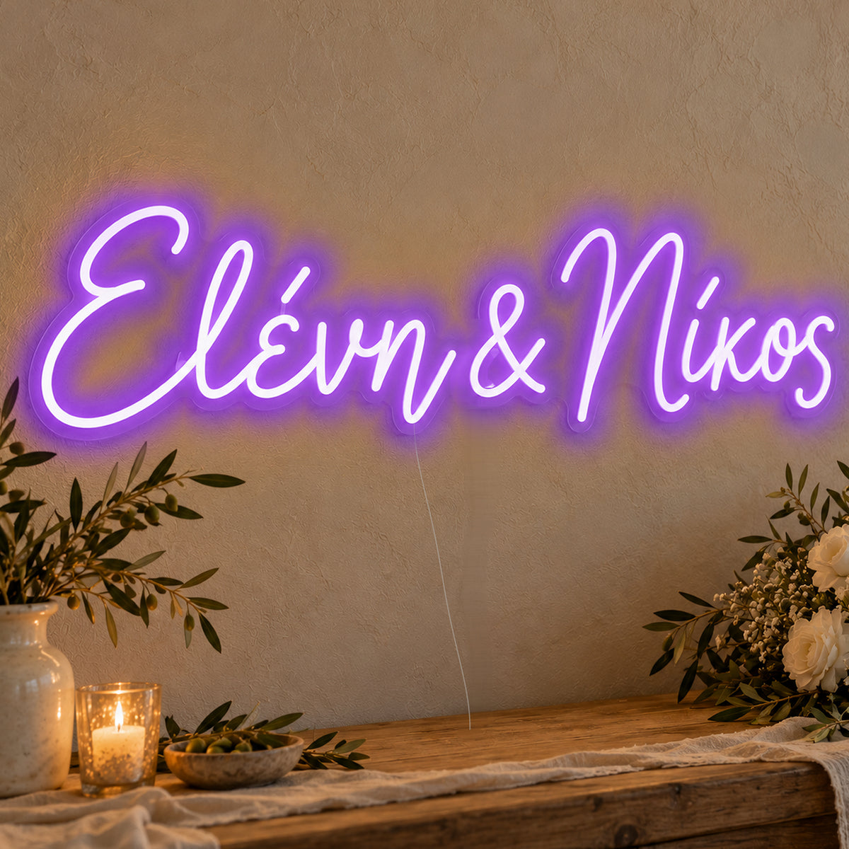 Personalised Greek Couple Names Neon Sign in purple LED neon on clear acrylic, angled view