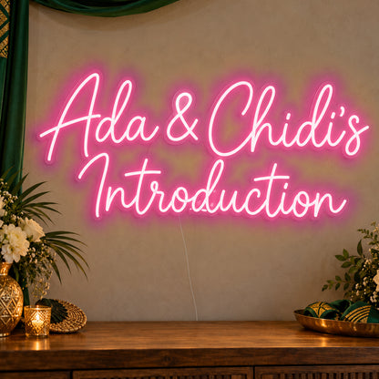 Personalised Introduction Neon Sign in rose red LED neon on clear acrylic, angled view