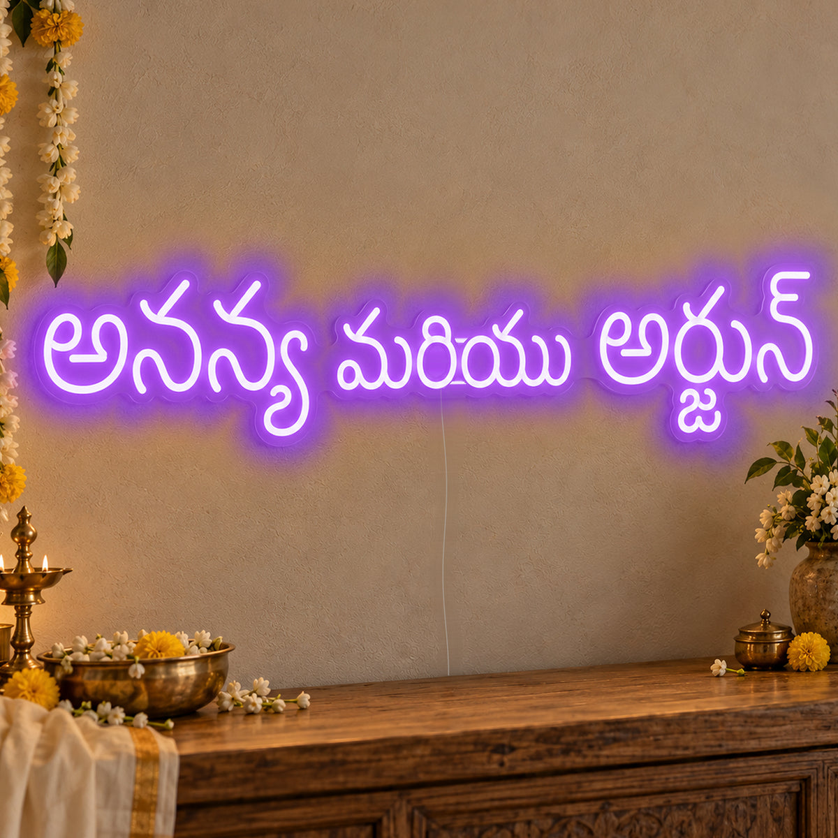 Personalised Telugu Couple Names Neon Sign in purple LED neon on clear acrylic, angled view
