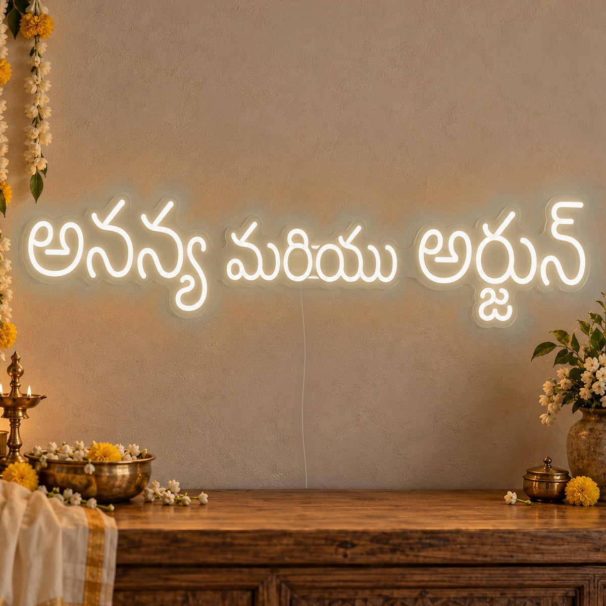 Personalised Telugu Couple Names Neon Sign in warm white LED neon on clear acrylic, angled view