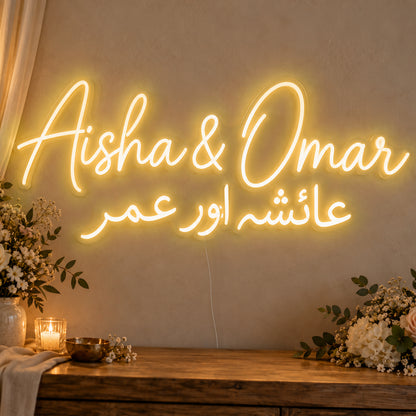 Personalised Two Script Names Neon Sign in gold LED neon on clear acrylic, angled view