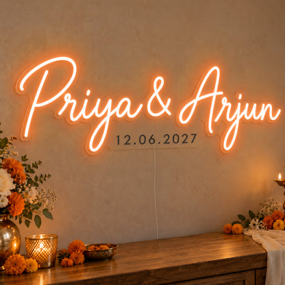 Personalised Wedding Date Neon Sign in orange LED neon on clear acrylic, angled view