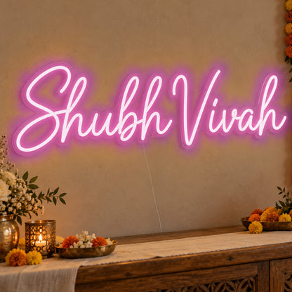 Shubh Vivah Neon Sign in pink LED neon on clear acrylic, angled view