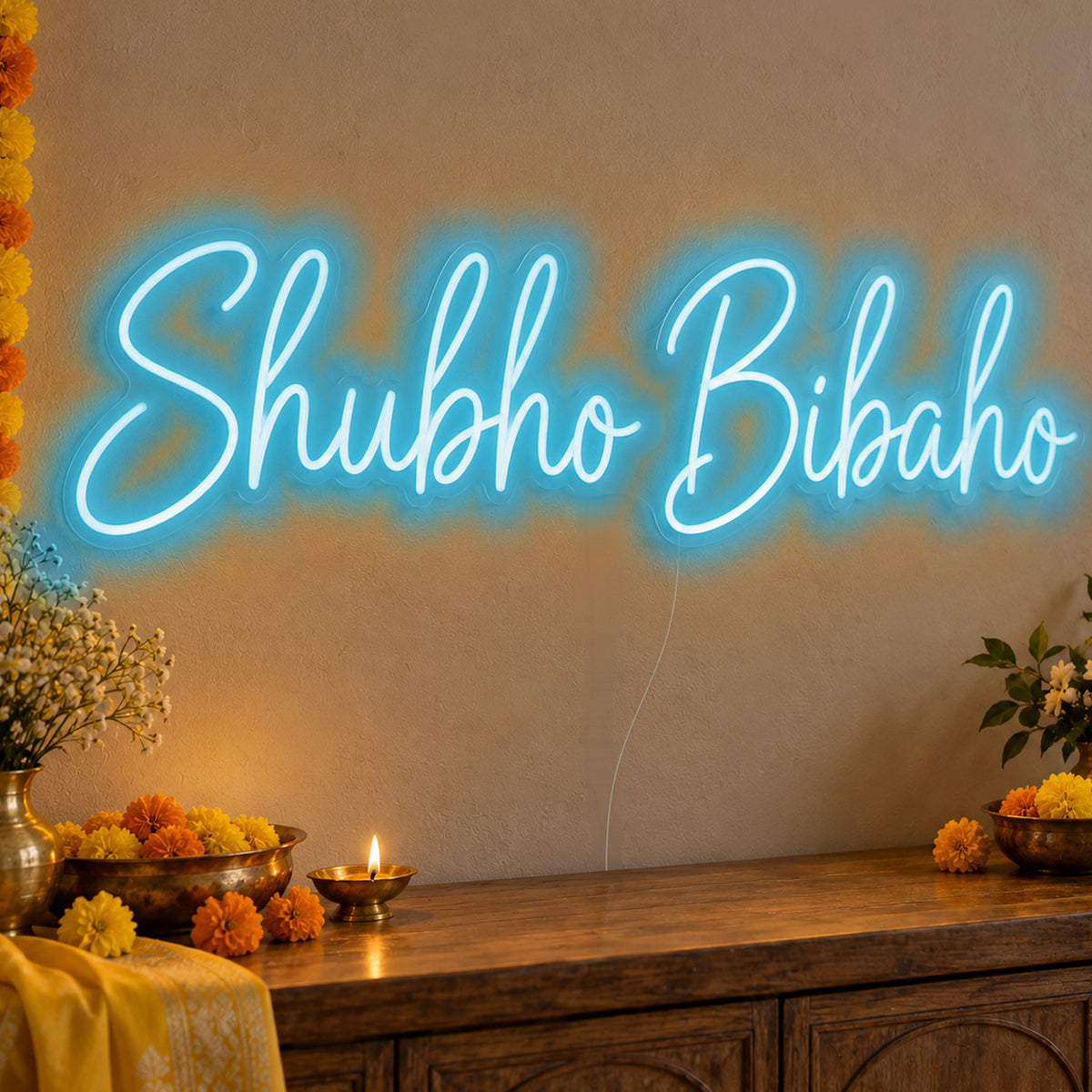 Shubho Bibaho Neon Sign in ice blue LED neon on clear acrylic, angled view