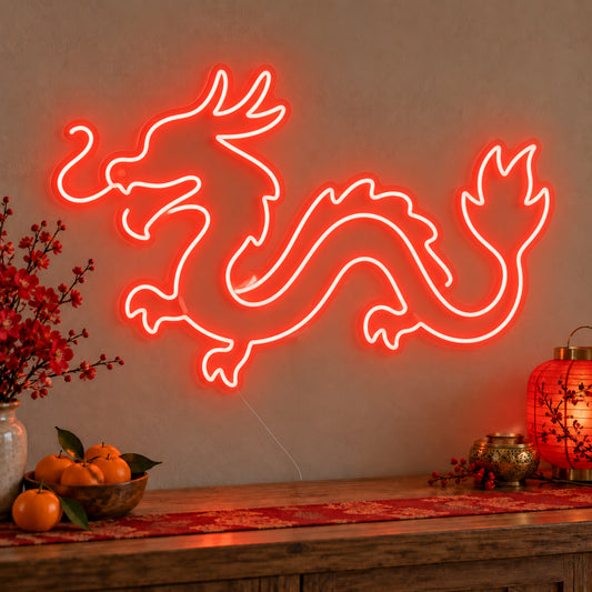 Zodiac Dragon Neon Sign on clear cut-to-shape acrylic, illuminated on a wall in a styled celebration setting